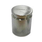 Cylindrical calibration weight.